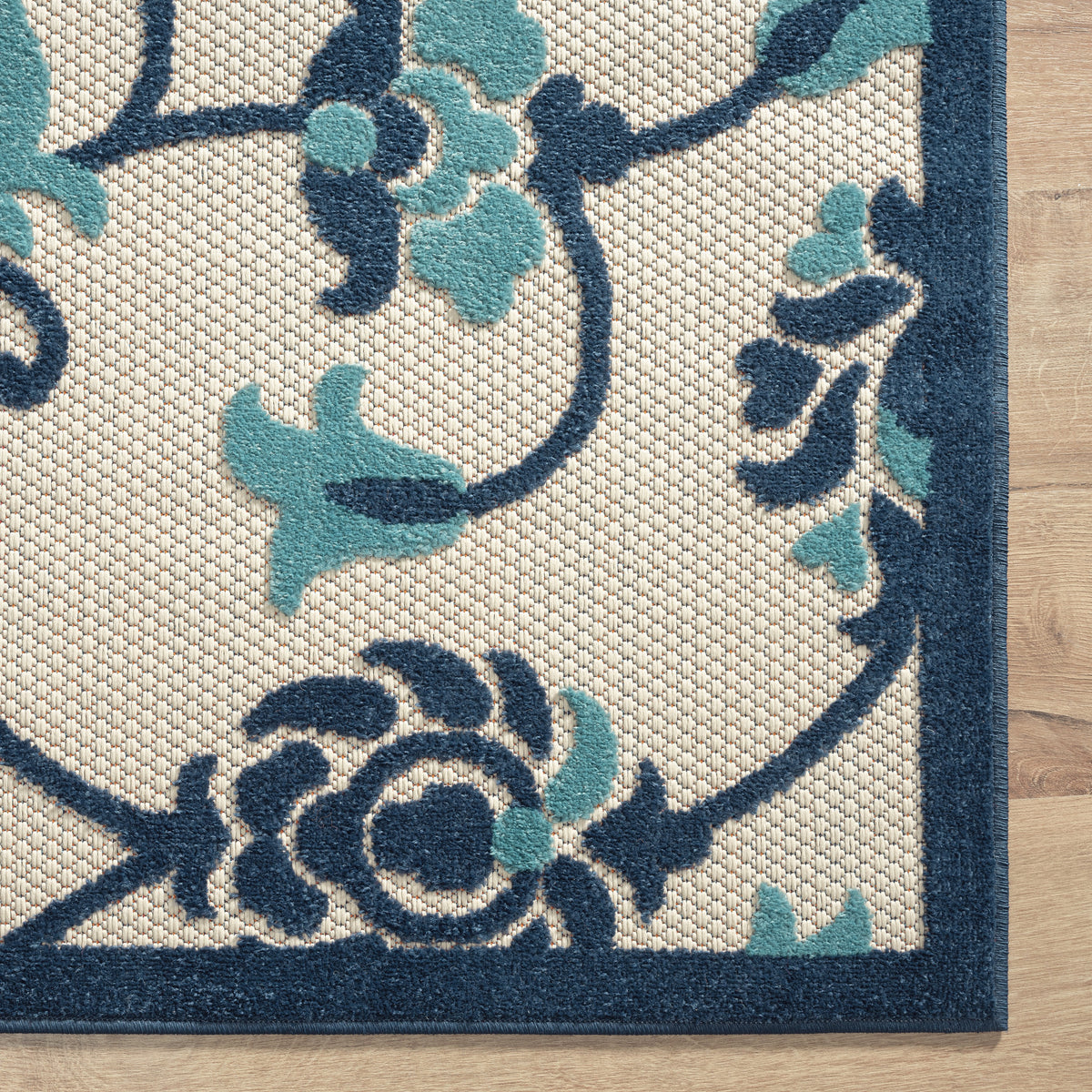 Ox Bay Blue Coastal Floral Filigree Hi-Low Indoor/Outdoor Area Rug - corner view