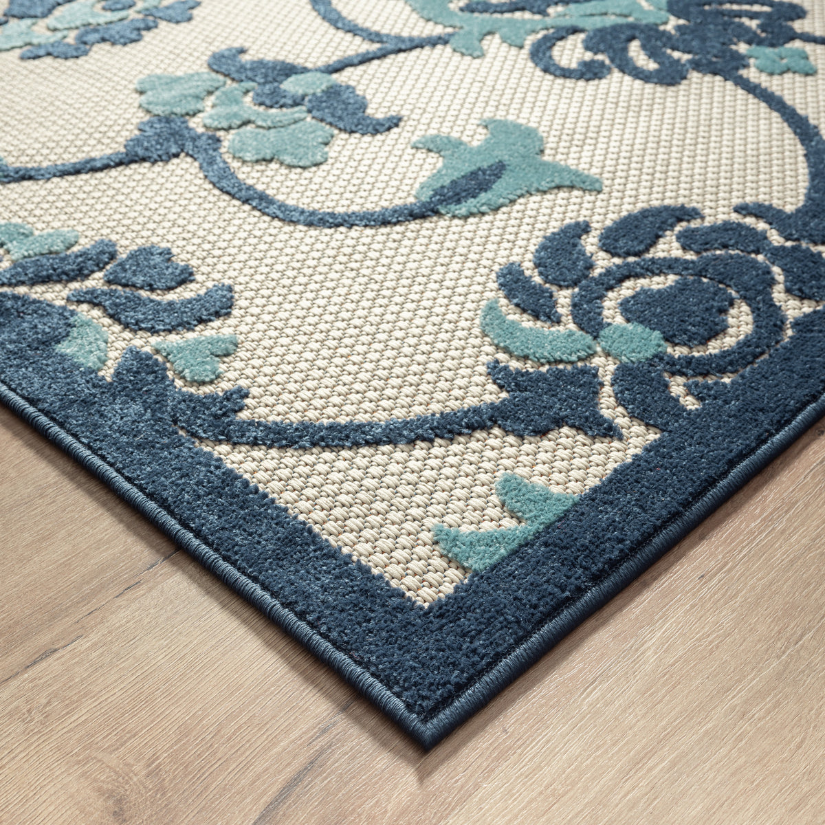 Ox Bay Blue Coastal Floral Filigree Hi-Low Indoor/Outdoor Area Rug - back view