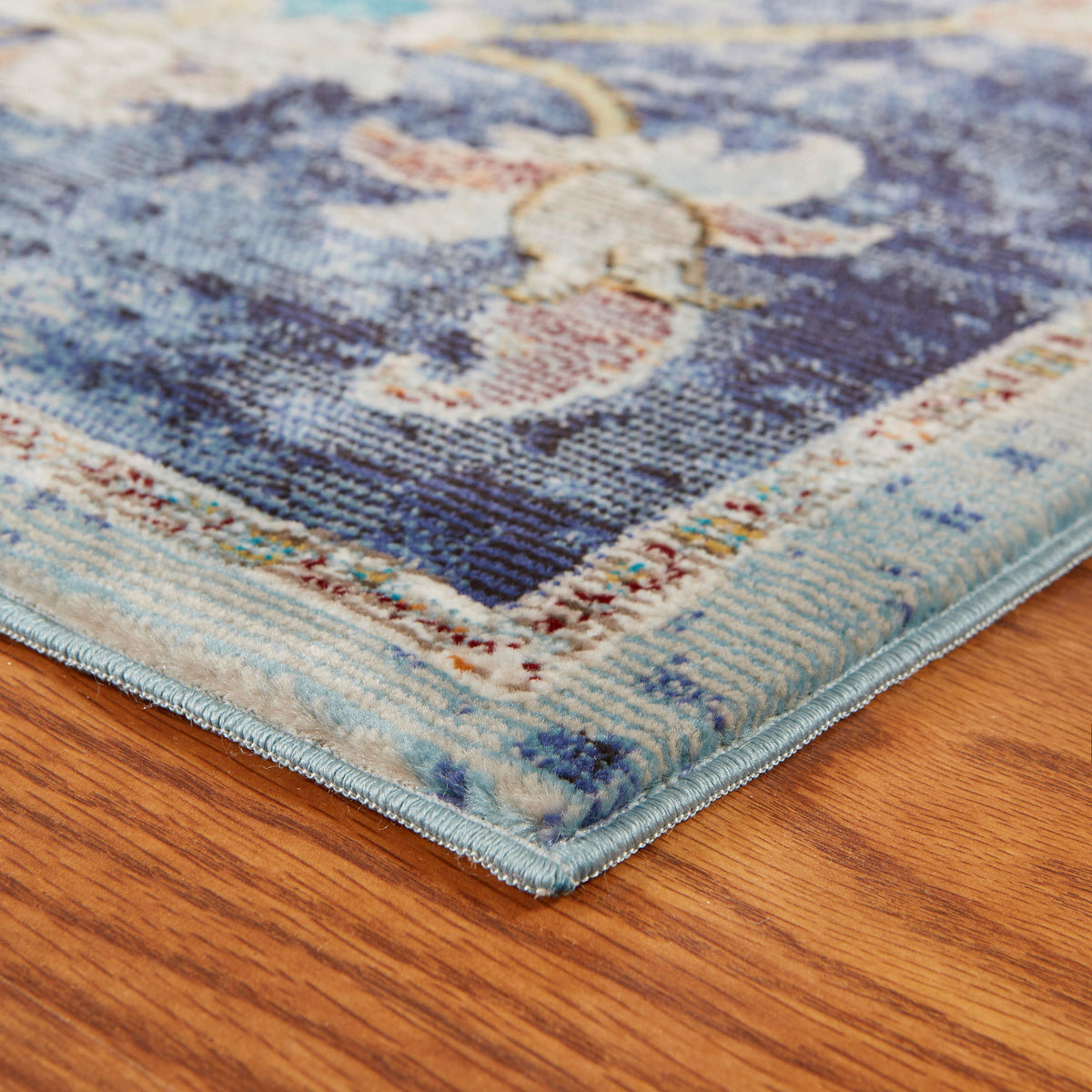 Ox Bay Navy/Multicolor Traditional Jacobean Indoor Area Rug - side angle view