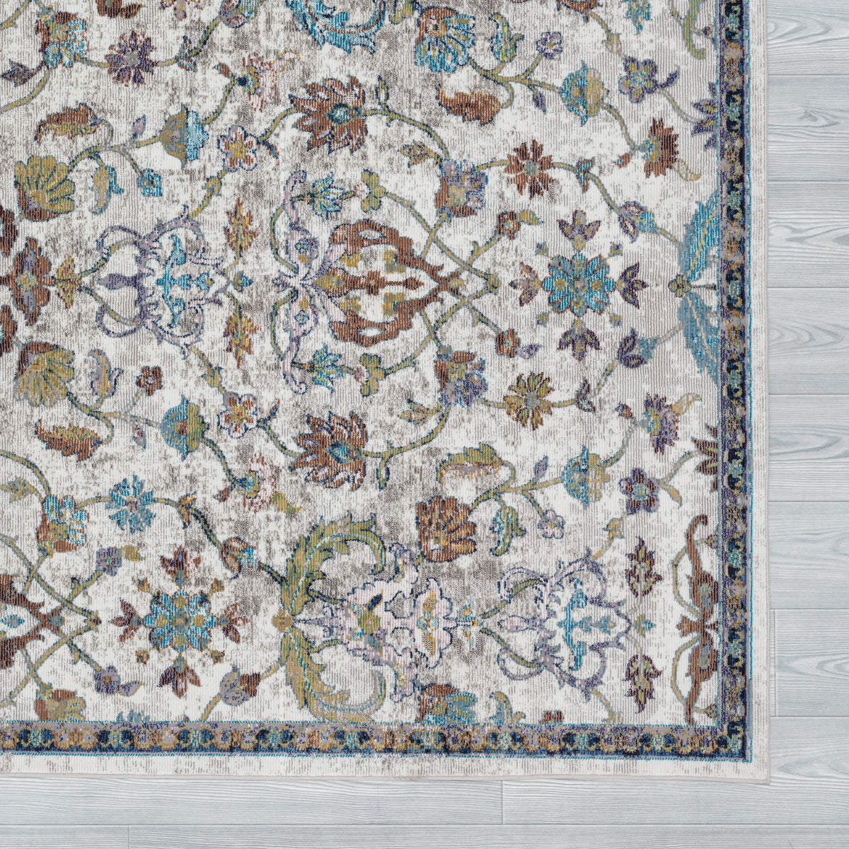 Galaxy Ivory/Blue Abstract Indoor Area Rug - side angle view