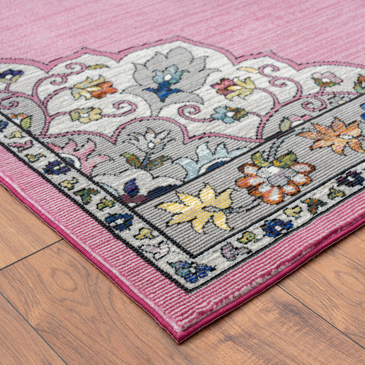 Blushing Traditional Medallion Gala Area Rug - side angle view