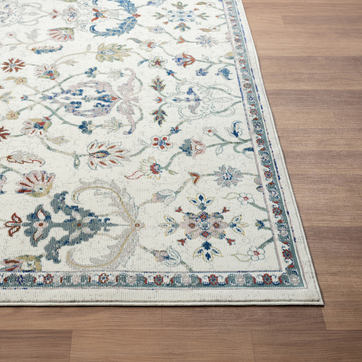 Ivory/Blue Bordered Traditional Indoor Area Rug - corner view