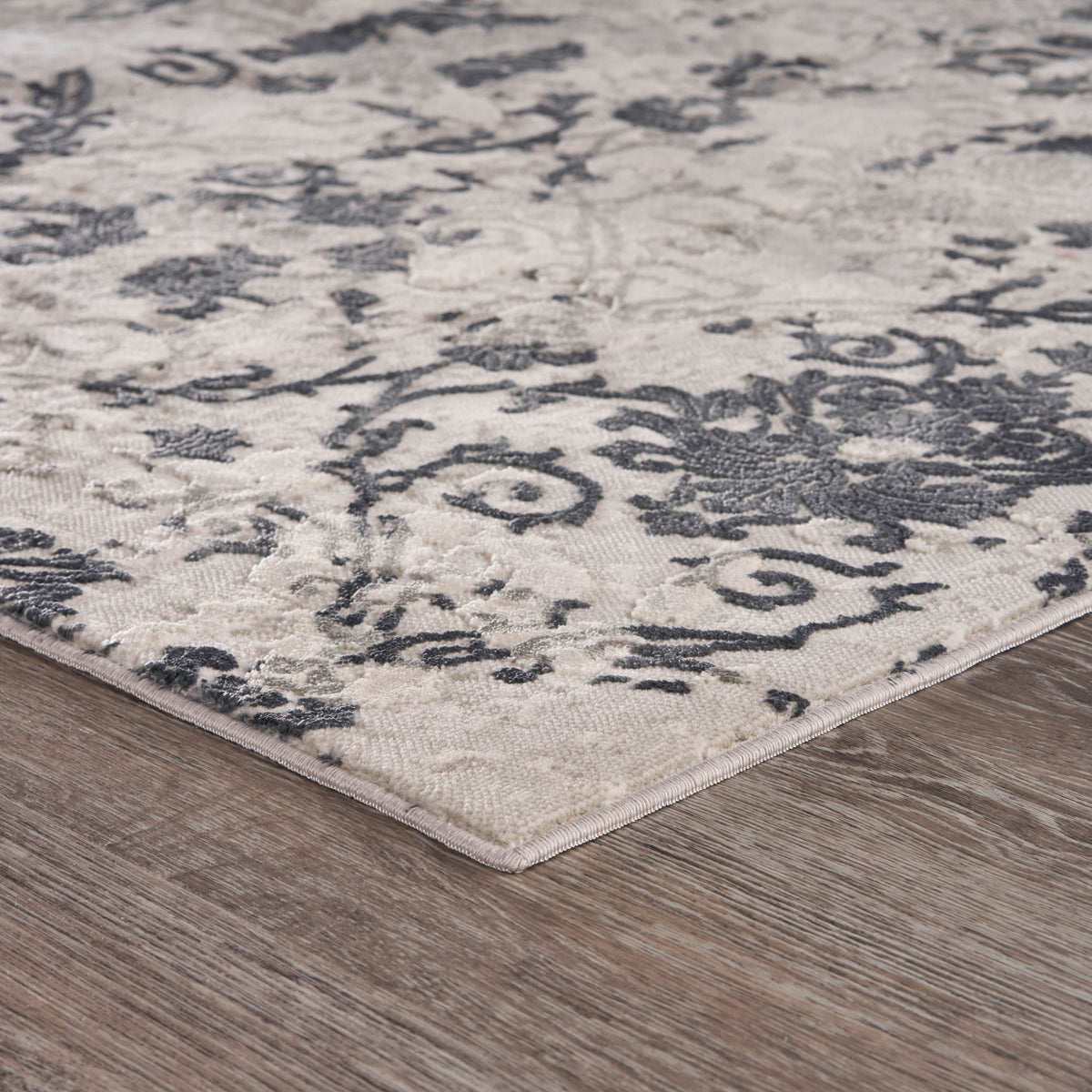 Neutral Distressed Damask Contemporary Area Rug - side angle view