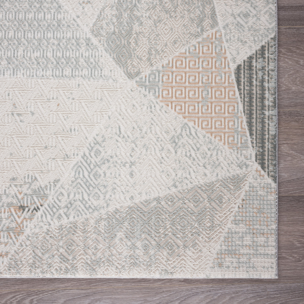 Neutral Distressed Diverse Geometric Contemporary Accent Rug - side angle view