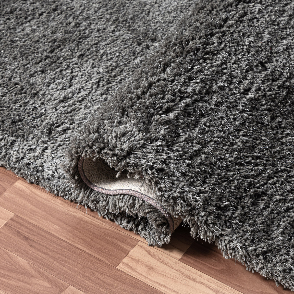 Black Shag Solid Hand-Loomed Polyester Indoor Area Rug - close-up detail