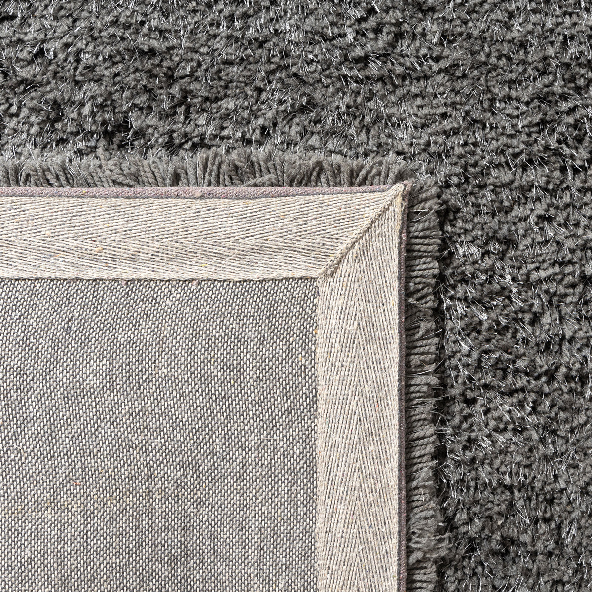 Black Shag Solid Hand-Loomed Polyester Indoor Area Rug - back view
