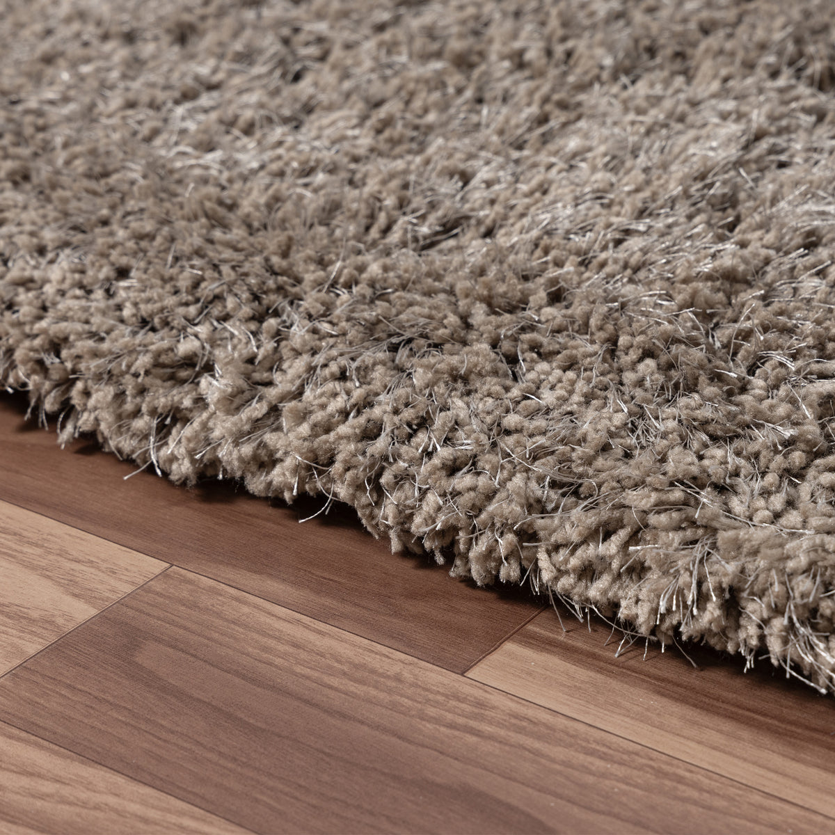 Silver Shag Solid Hand-Loomed Polyester Indoor Area Rug - side angle view