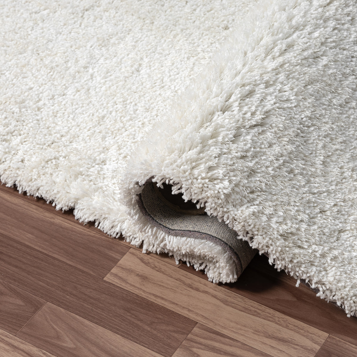 Ivory Shag Solid Hand-Loomed Polyester Indoor Area Rug - close-up detail