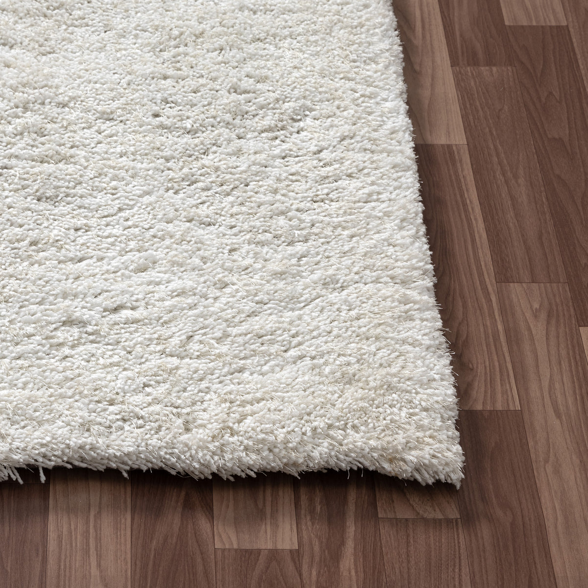 Ivory Shag Solid Hand-Loomed Polyester Indoor Area Rug - corner view