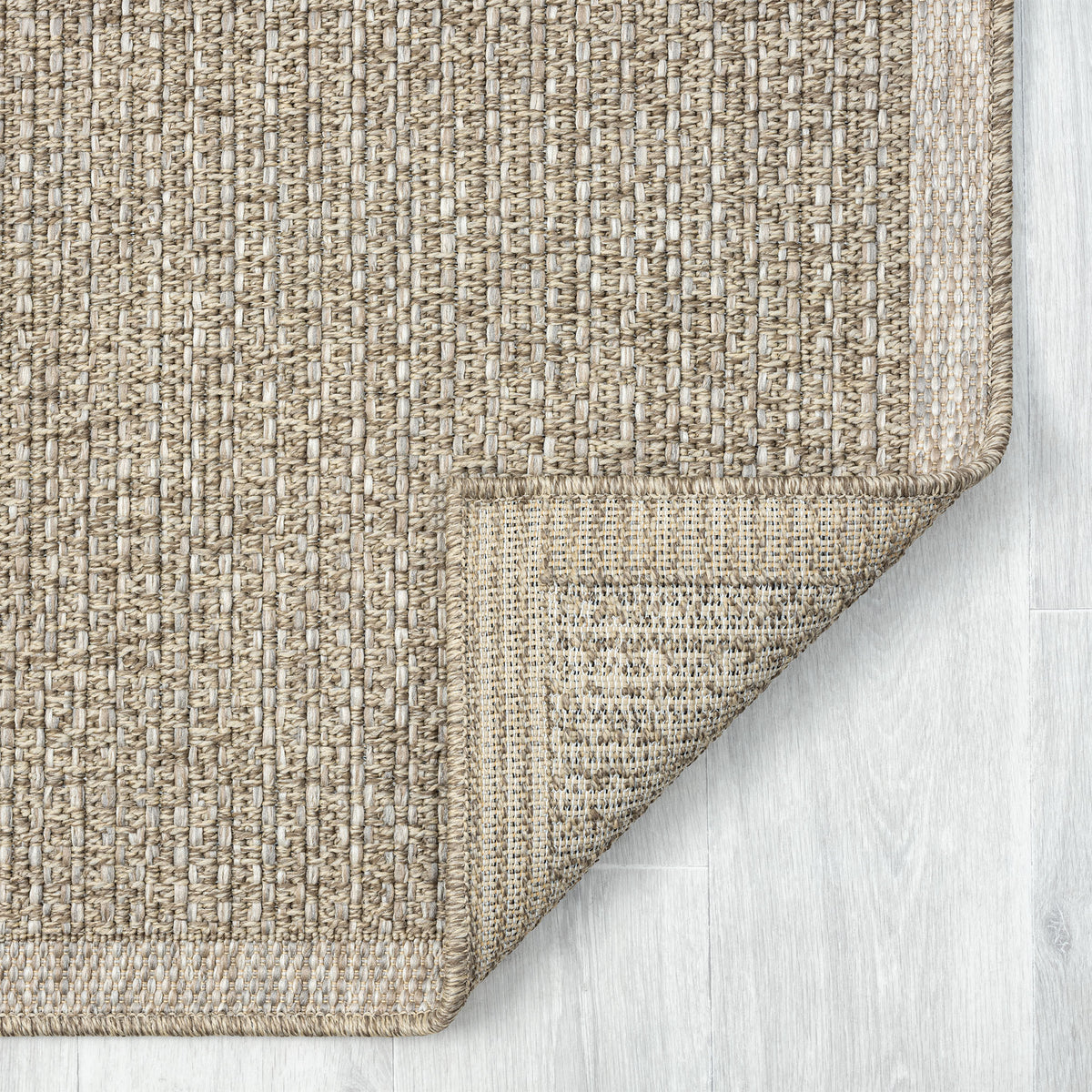 Oslo Modern Solid Brown Indoor Outdoor Area Rug - back view