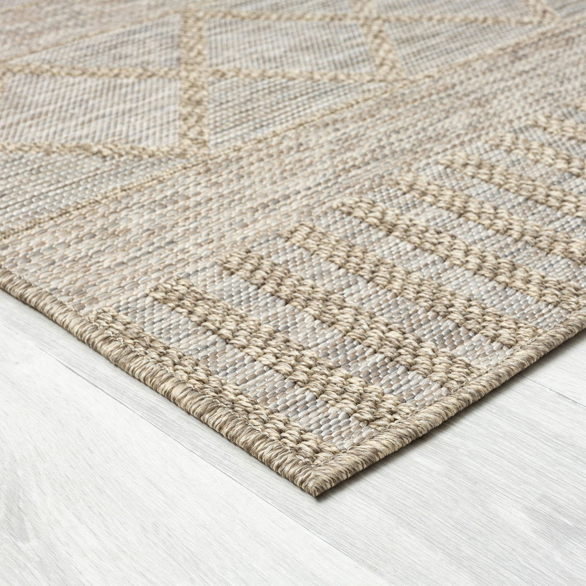 Oslo Contemporary Diamond Brown Indoor Outdoor Area Rug - side angle view