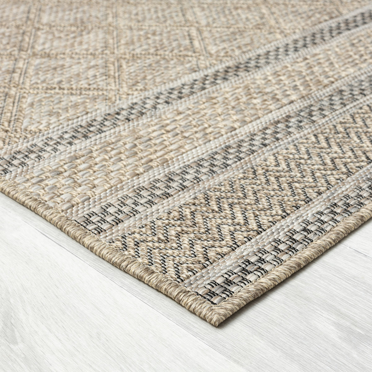 Oslo Contemporary Geometric Brown Indoor Outdoor Area Rug - side angle view