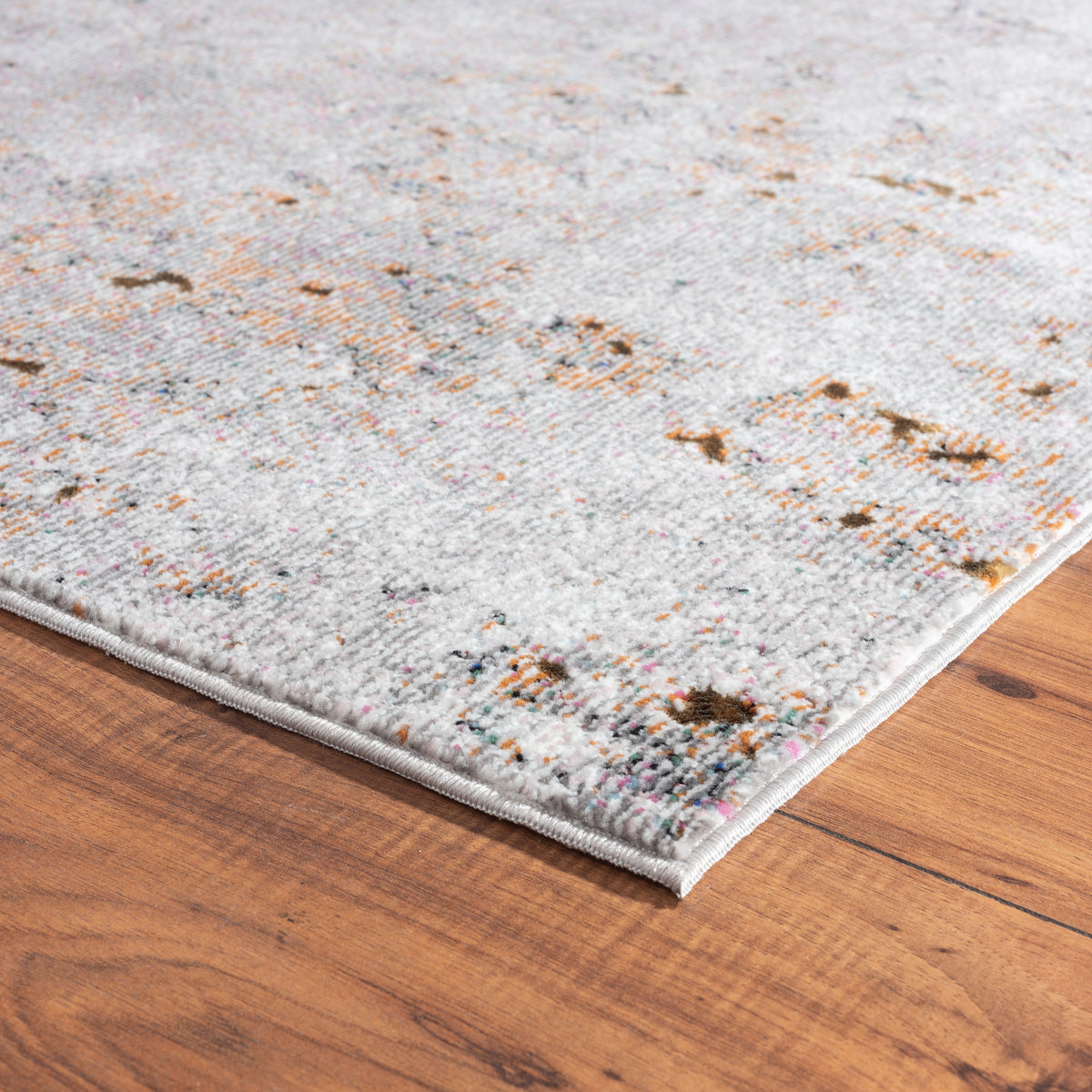 Modern Specks of Color Revolution Area Rug - side angle view