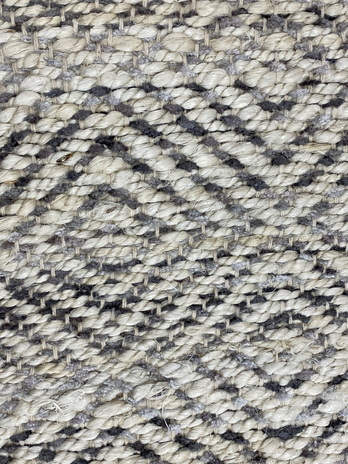 Hand-Woven Geometric Gray and Jute Rug - lifestyle view