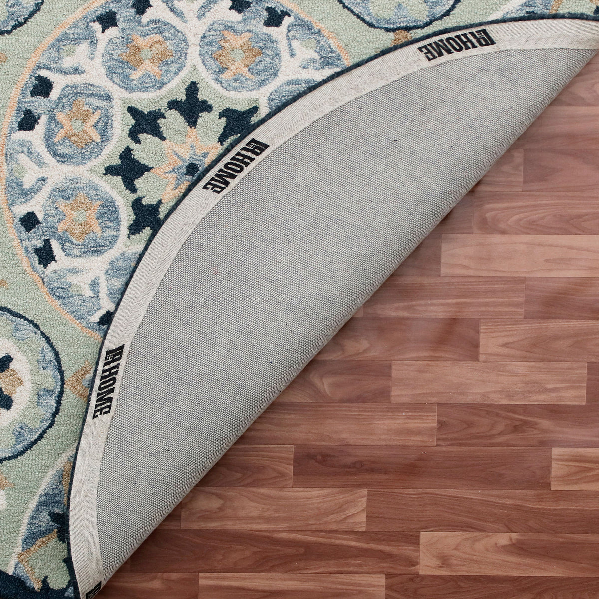 RugsA Sage/Blue Suzani Wool Round Rug - back view