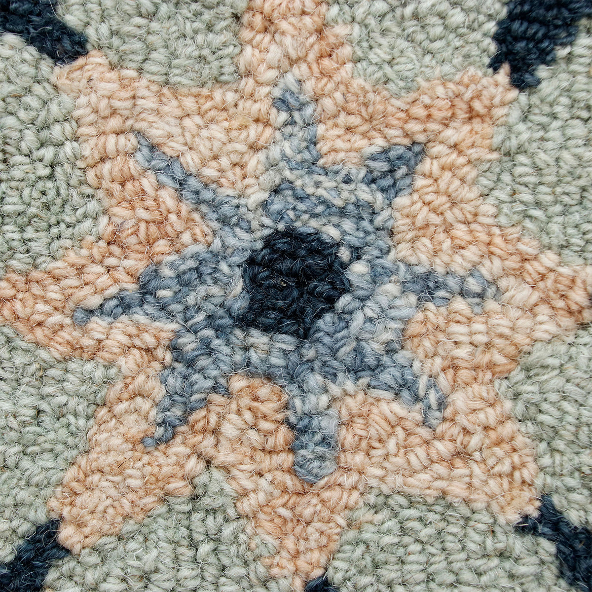 RugsA Sage/Blue Suzani Wool Round Rug - close-up detail