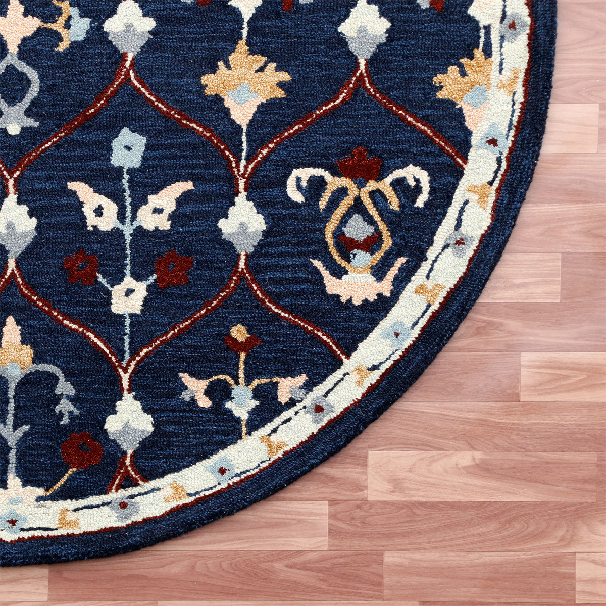 RugsA Navy/Red Trellis Wool Round Rug - corner view