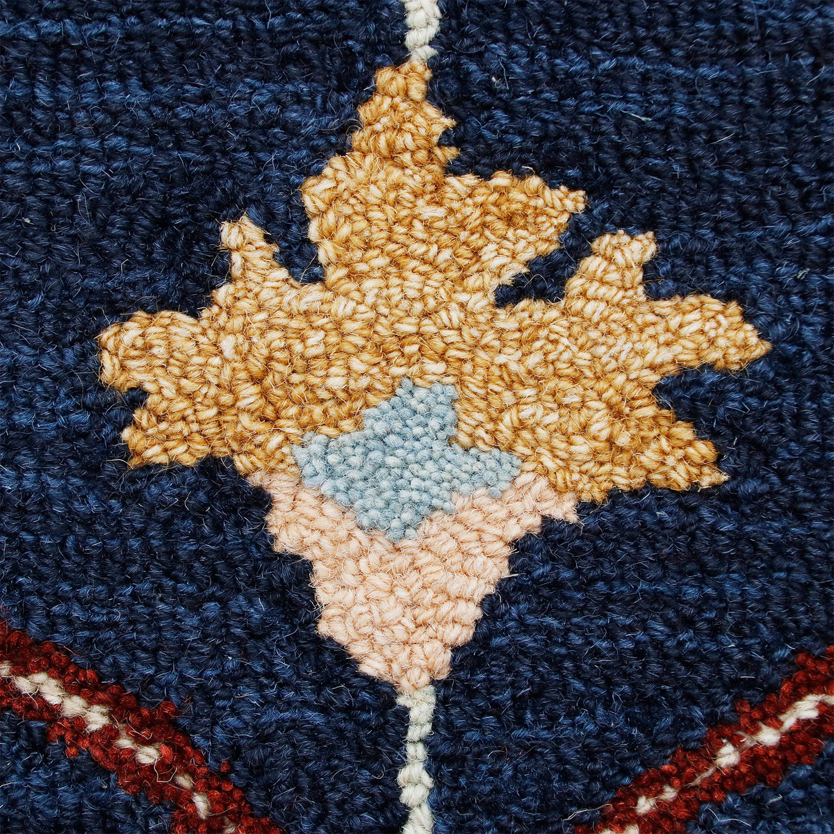 RugsA Navy/Red Trellis Wool Round Rug - close-up detail