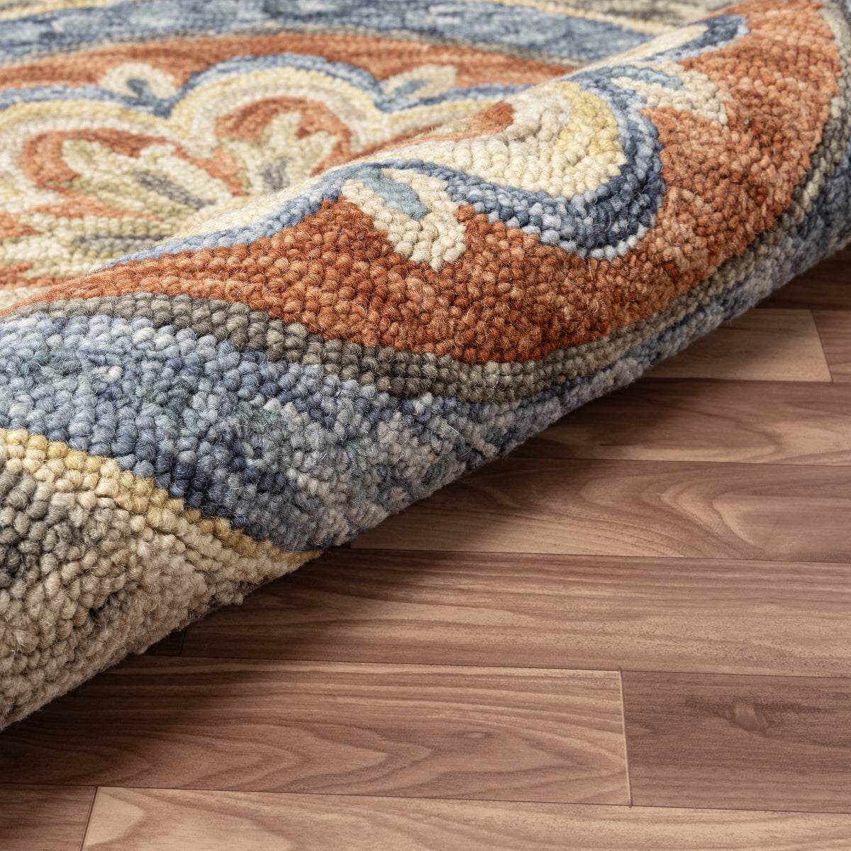 Rust Floral Farmhouse Hand-Woven Wool Indoor Area Rug - close-up detail