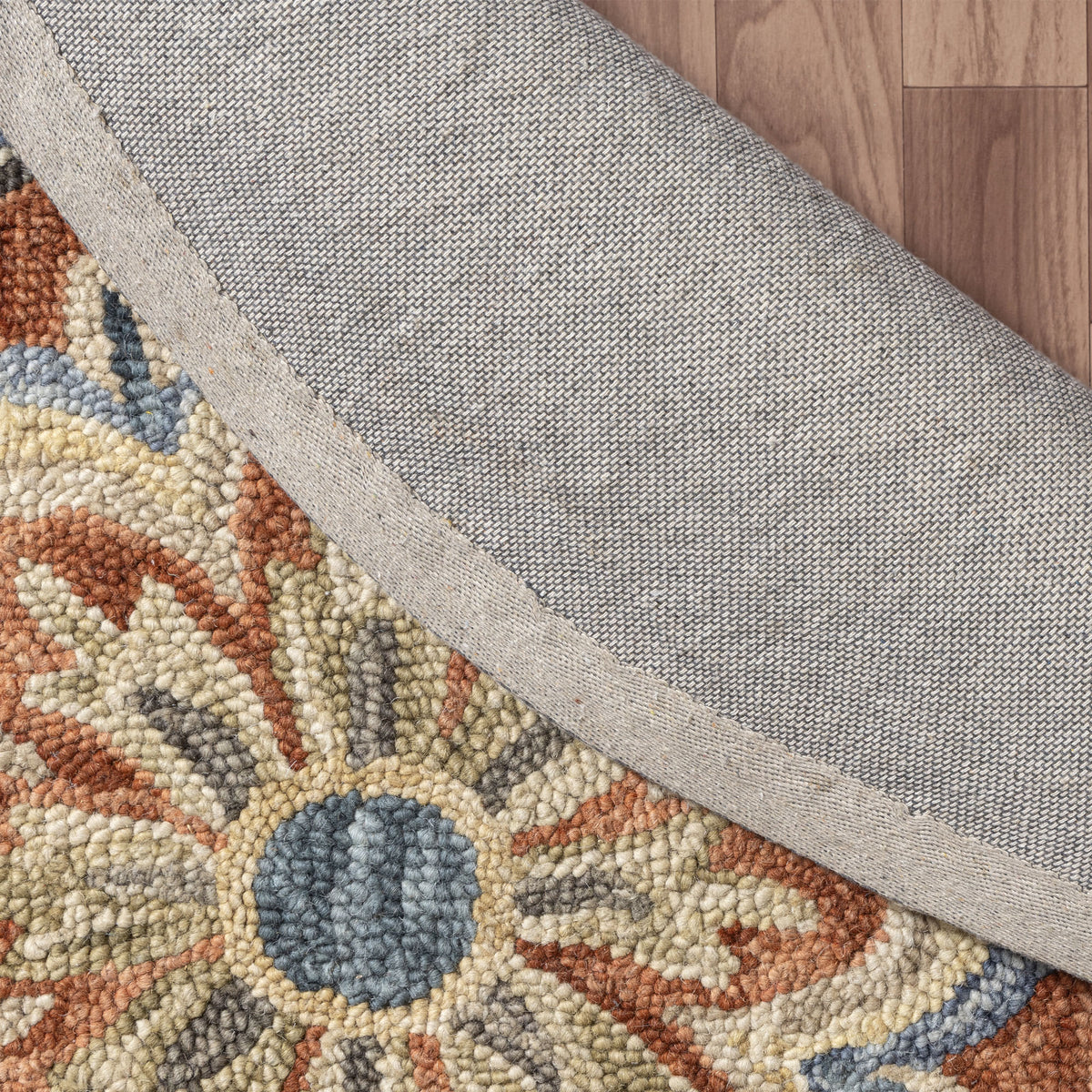 Rust Floral Farmhouse Hand-Woven Wool Indoor Area Rug - back view