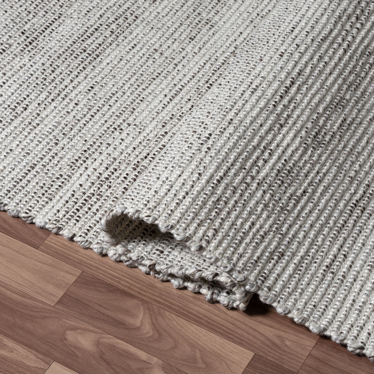 Brown/Ivory Rustic Solid Hand-Woven Polyester Indoor Area Rug - close-up detail