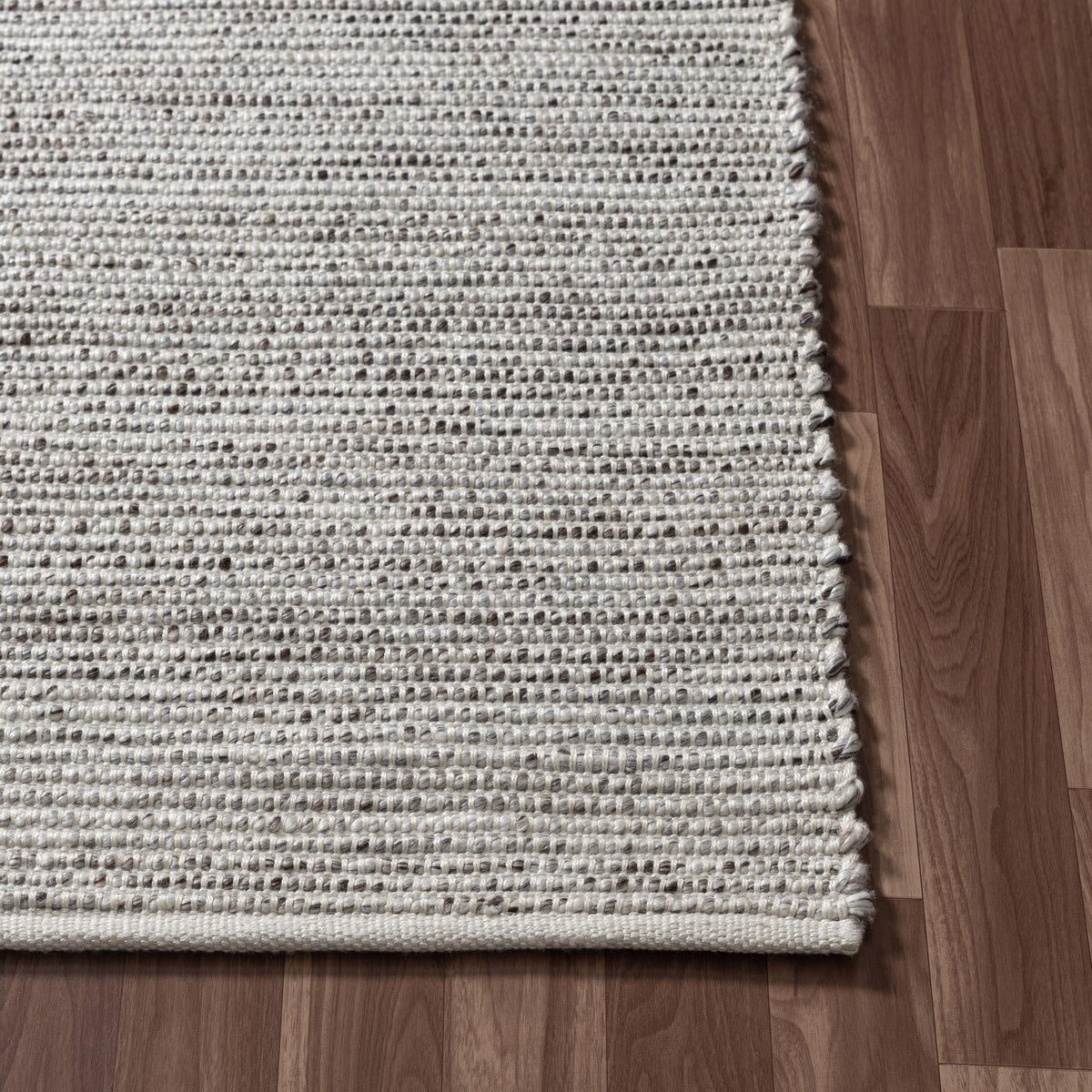 Brown/Ivory Rustic Solid Hand-Woven Polyester Indoor Area Rug - corner view
