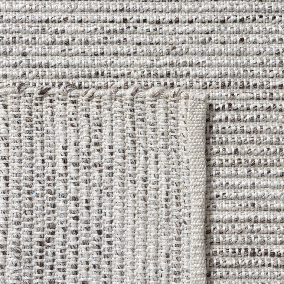 Brown/Ivory Rustic Solid Hand-Woven Polyester Indoor Area Rug - back view
