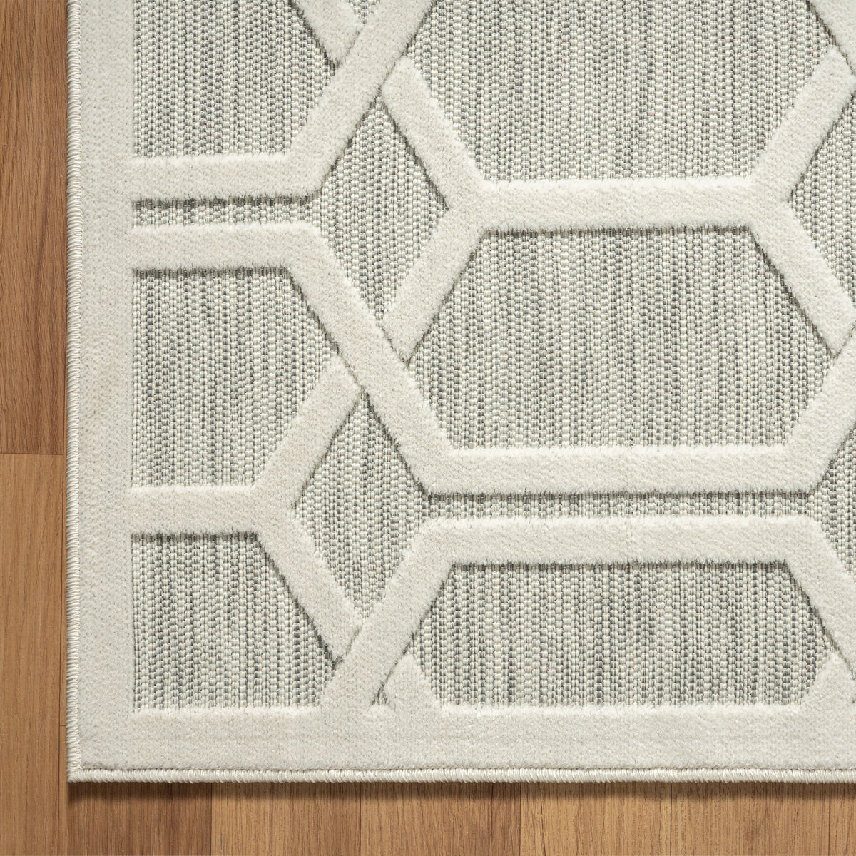Geometric Hi-Low Modern Gray Indoor Outdoor Area Rug - side angle view