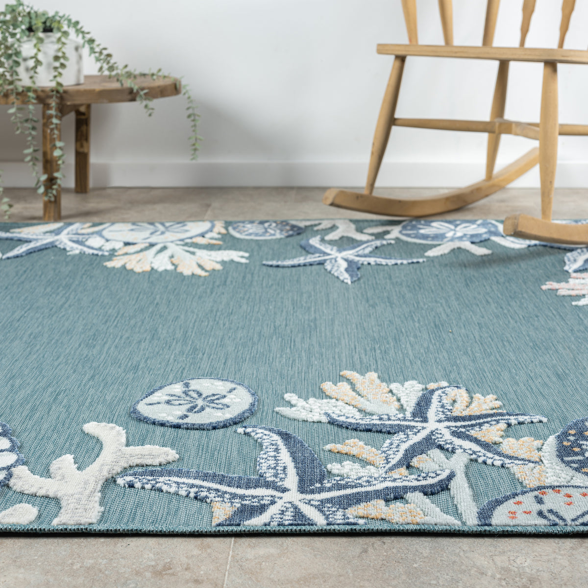 Aqua/Blue Coastal Floral/Botanical Performance Indoor/Outdoor Area Rugs - side angle view