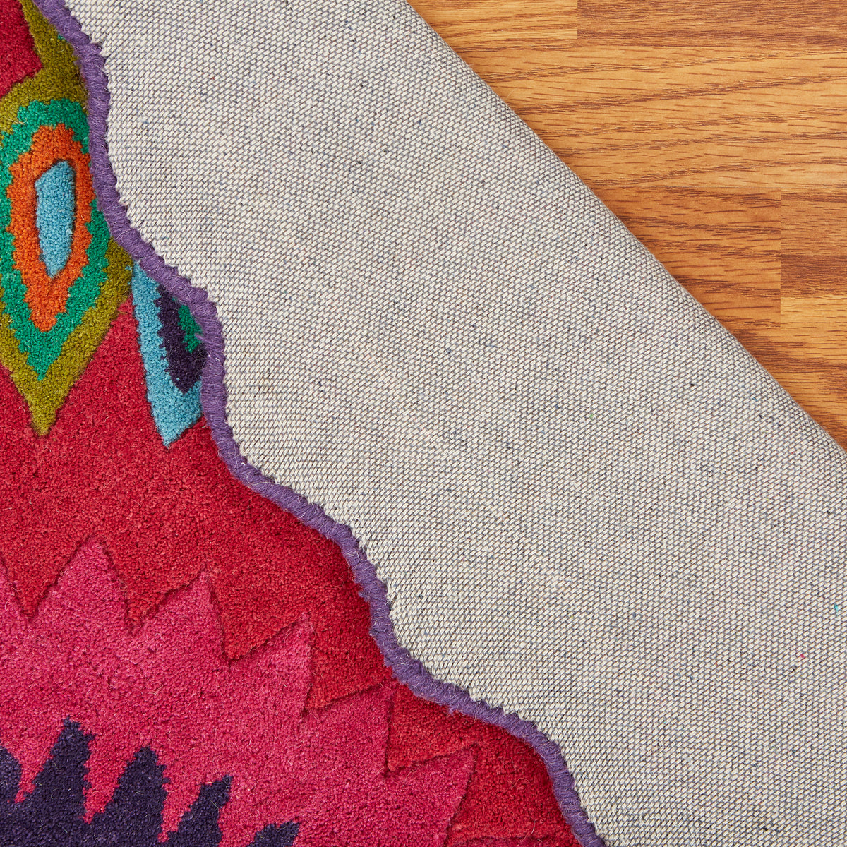 Pink Peacock Indoor Area Rug - back view