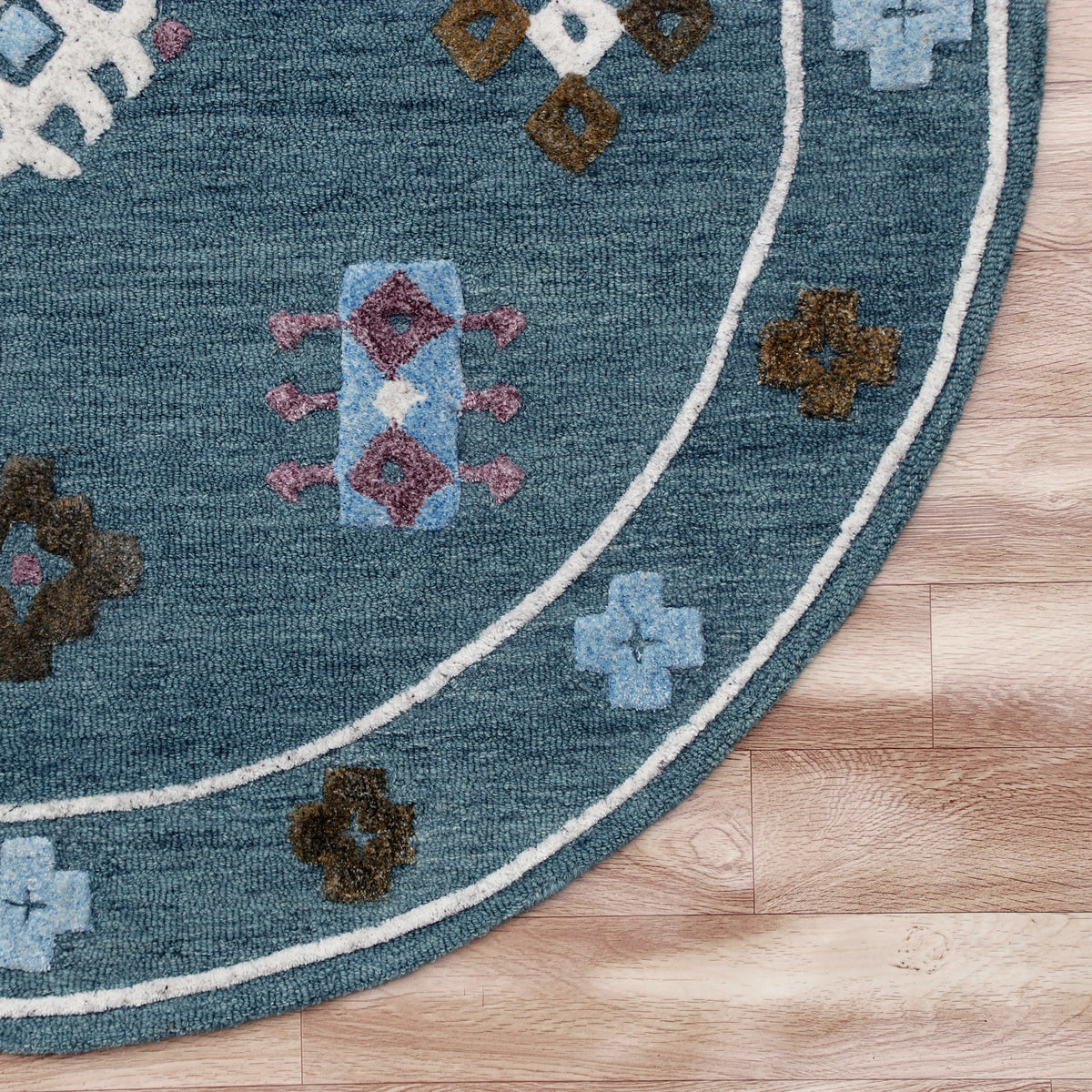 Hand Tufted Blue Bordered Geometric Round Rug - corner view