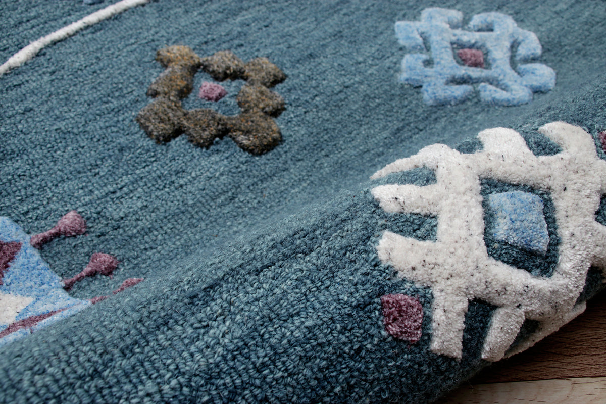 Hand Tufted Blue Bordered Geometric Round Rug - close-up detail