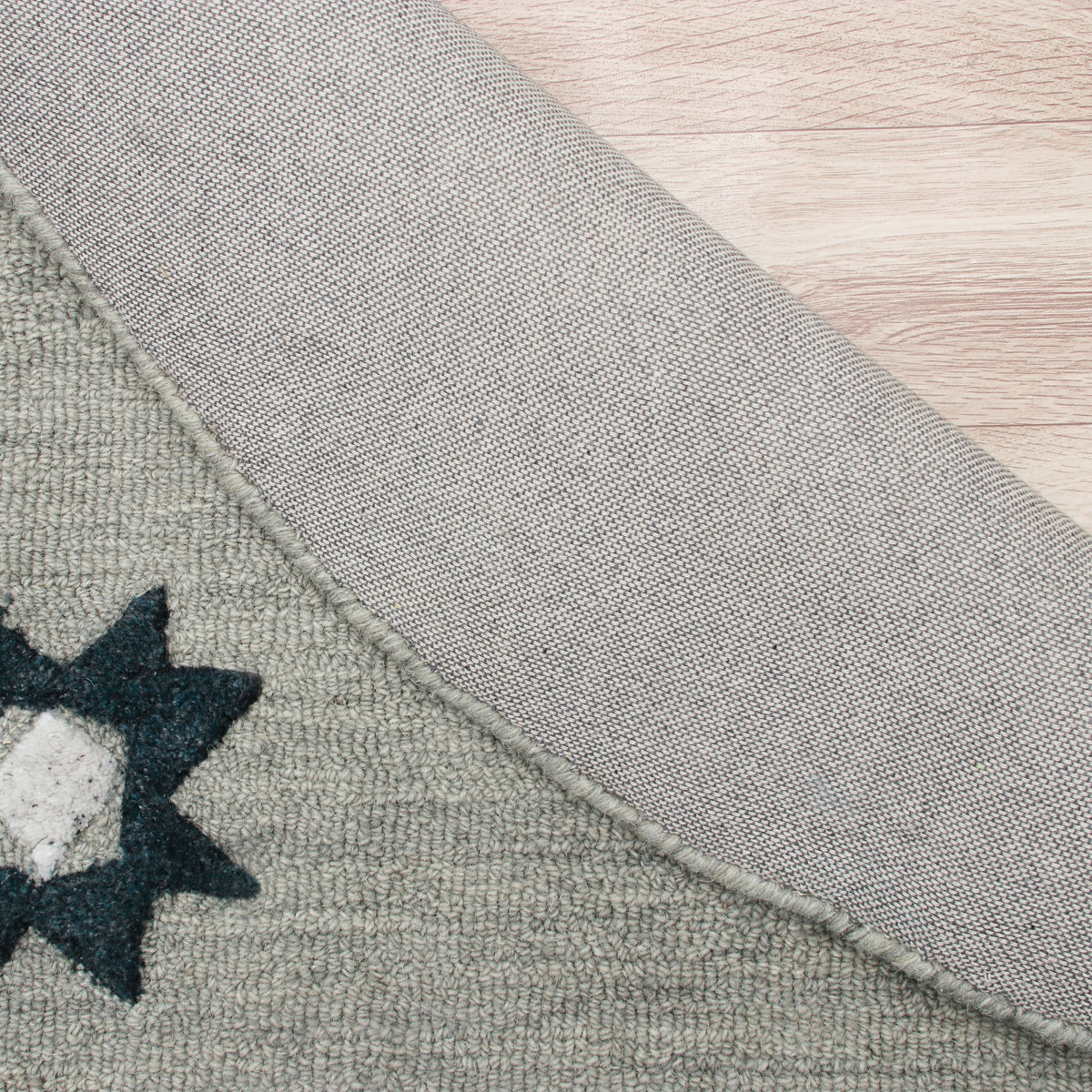 Hand Tufted Gray Geometric Bordered Round Rug - back view
