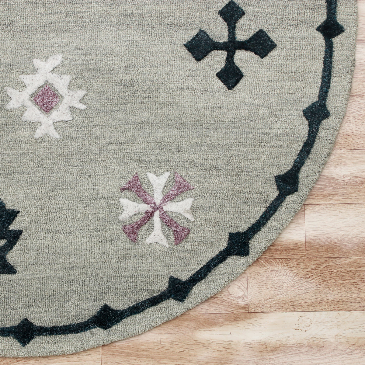 Hand Tufted Gray Geometric Bordered Round Rug - corner view