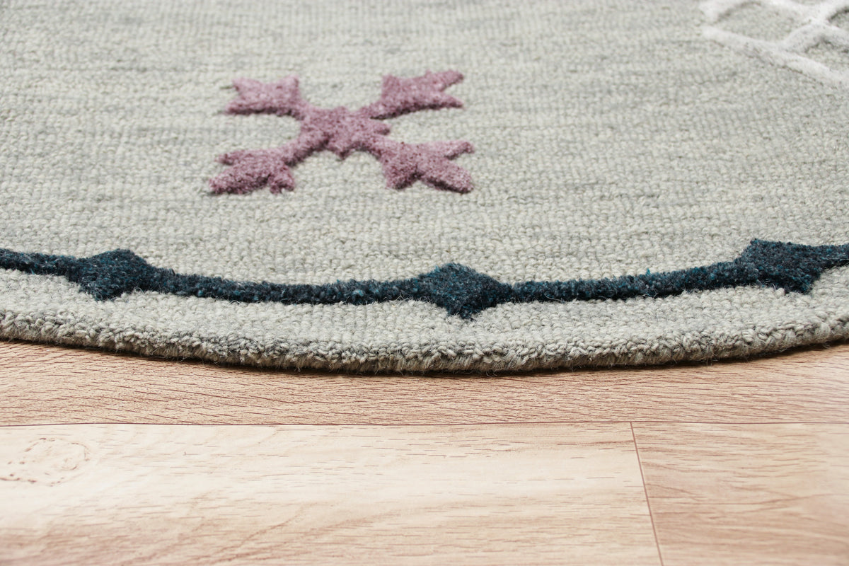 Hand Tufted Gray Geometric Bordered Round Rug - side angle view