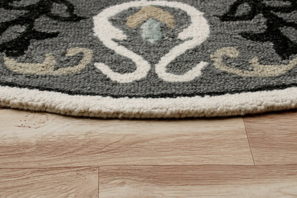 Ornate Gray and White Medallion Round Rug - side angle view