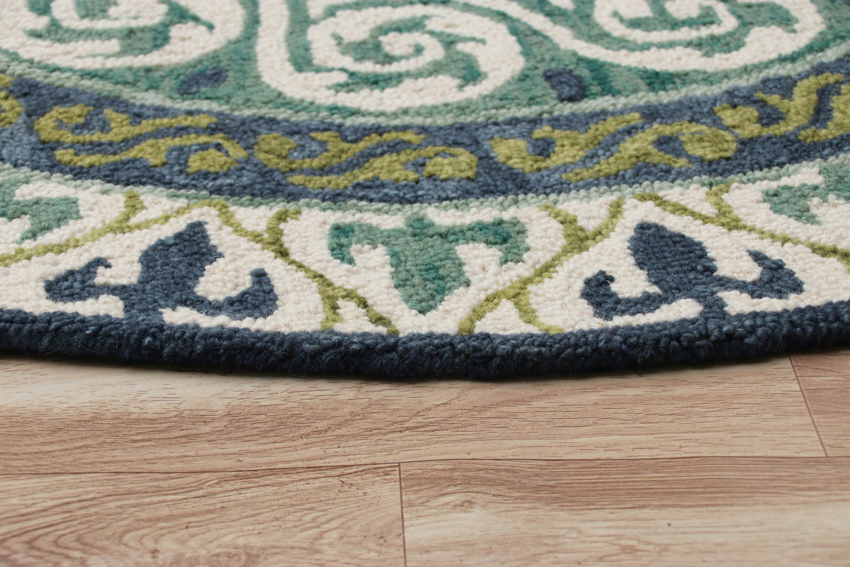 Blue and Green Geometric Medallion Round Rug - side angle view