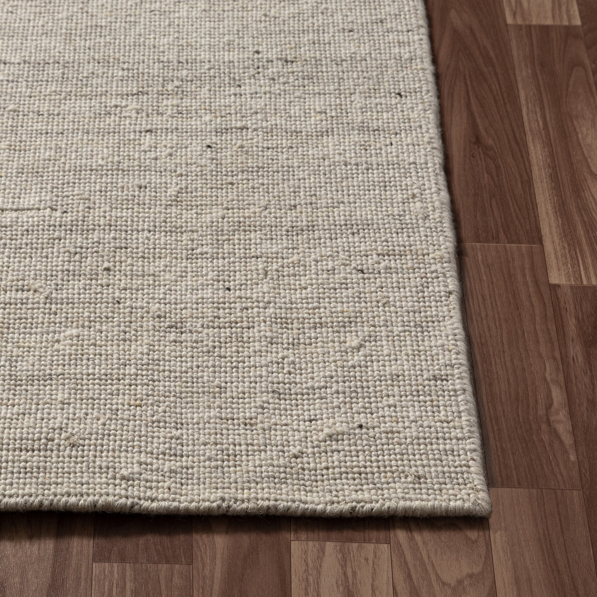 Ivory Modern Solid Handwoven Wool/Cotton Indoor Area Rug - corner view