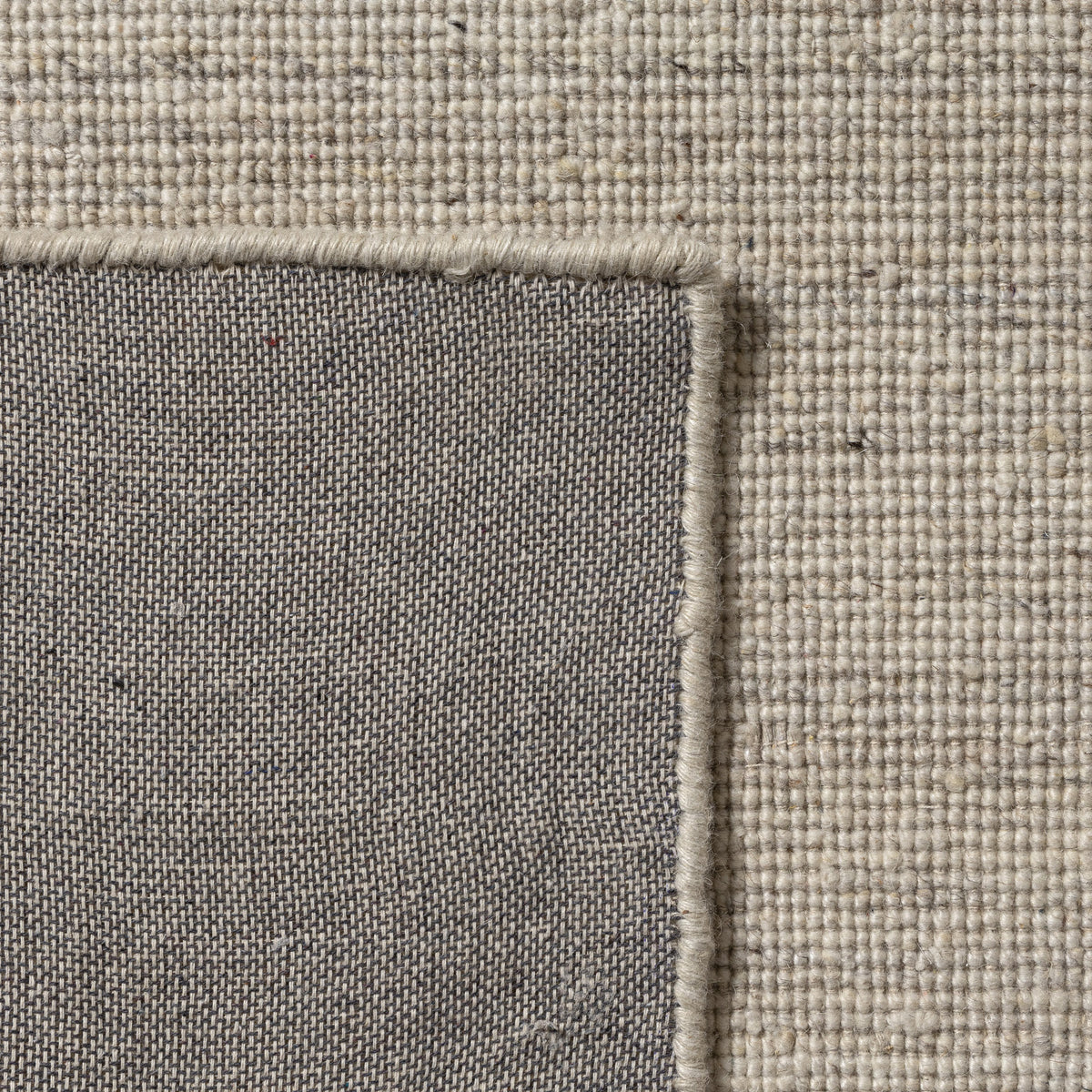 Ivory Modern Solid Handwoven Wool/Cotton Indoor Area Rug - back view